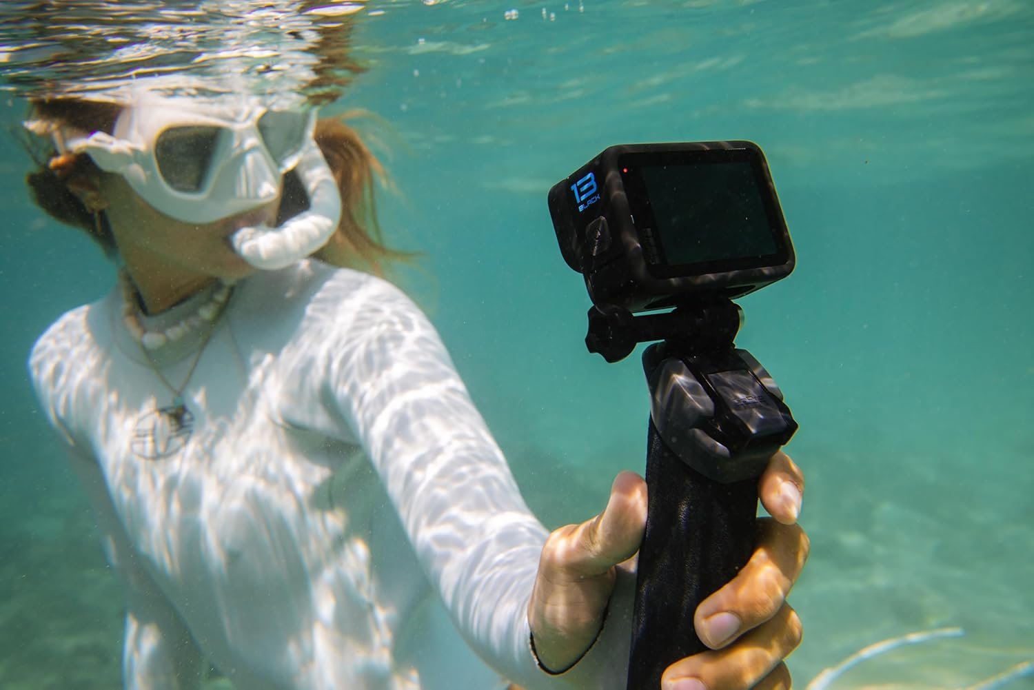 GoPro HERO13 Black Accessory Bundle - Includes The Handler, 2 Enduro Batteries, 2 Curved Adhesive Mounts, 64GB SanDisk MicroSD Card, and Carrying Case 2 GoPro HERO13 Black Accessory Bundle - صورة 2